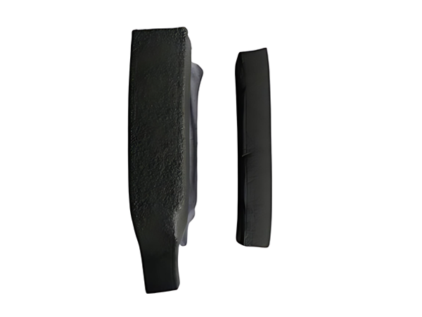 A roll of black bentonite strip waterstop on a white background